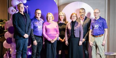 ILGA Members and staff, ClubsNSW staff, Revesby Workers' Club staff, stand in front of Purple Friday 2026 signage.